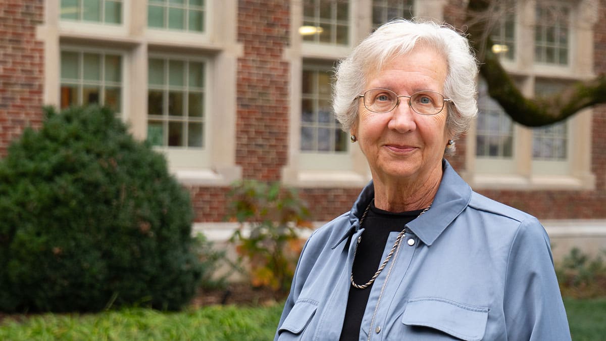 Ruth Henderson McQueen in front of Morgan Hall