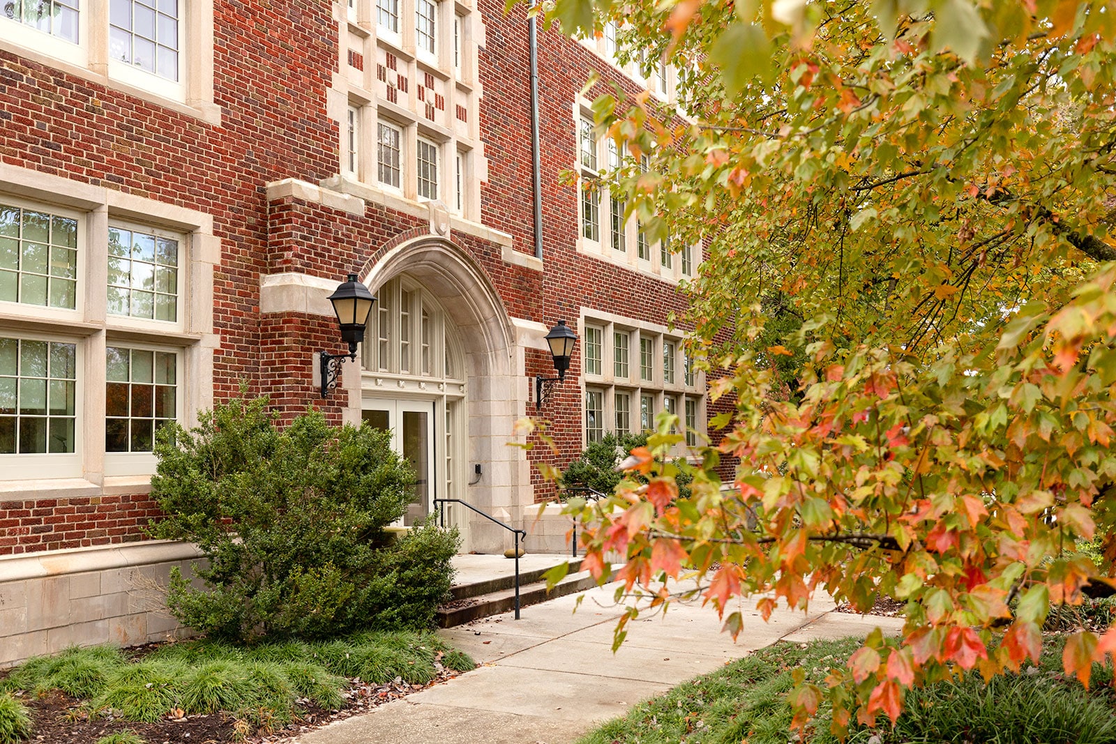 Photo of the side entrance of Morgan Hall on a fall day